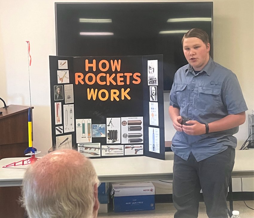 Joseph Kilgore, of Taberg, develops his public speaking skills as he shares How Rockets Work to an audience, including a pair of volunteer judges, during the 4-H Public Presentation Day on Saturday.