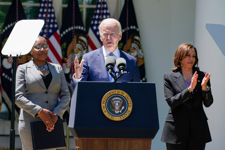 Vice President Kamala Harris applauds as President Joe Biden speaks at an event on lowering the cost of high-speed internet in the Rose Garden of the White House, Monday in Washington.