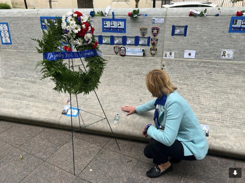 U.S. Congresswoman Claudia Tenney, R-22, New Hartford, honors the memory of fallen Oneida County Sheriff&rsquo;s Deputy Kurt B. Wyman on Thursday at the National Law Enforcement Officers Memorial in Washington D.C. as part of National Police Week.