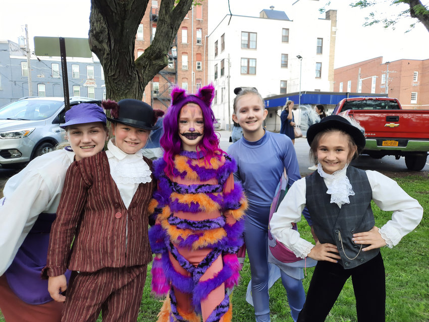 The Oneida Parks and Recreation Department's &quot;Through the Looking Glass&quot; event featured  members of the Bogardus Performing Art Center and the city taking the role of beloved characters of &quot;Alice in Wonderland,&quot; with actors taking center stage in storefronts through the city.