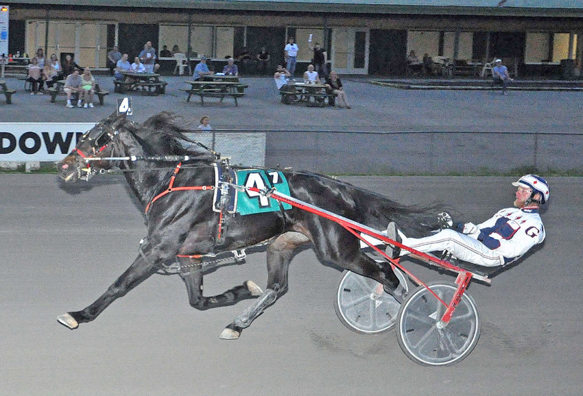 Discus Hanover and driver Truman Gale won the $7,700 Open Trot Saturday at Vernon Downs. A late charge earned them the win in 1:55.1. Discus Hanover, a 5-year-old gelding, earned his first win of the season in the race.