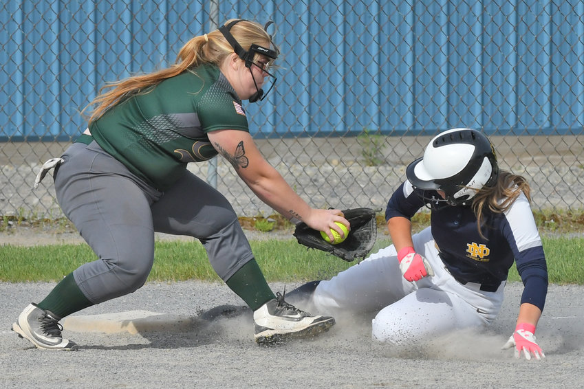 Adirondack&rsquo;s Ashley Lawrence puts the tag on Utica Notre Dame baserunner Sam Paparella in the teams&rsquo; Section III Class C first round playoff game. The visiting Jugglers of Notre Dame won 5-1 to advance to Tuesday&rsquo;s second round game against top seed Port Pyron. Results were not available for that game at press time. In Monday&rsquo;s win, Paparella had two hits, an RBI and a run scored.