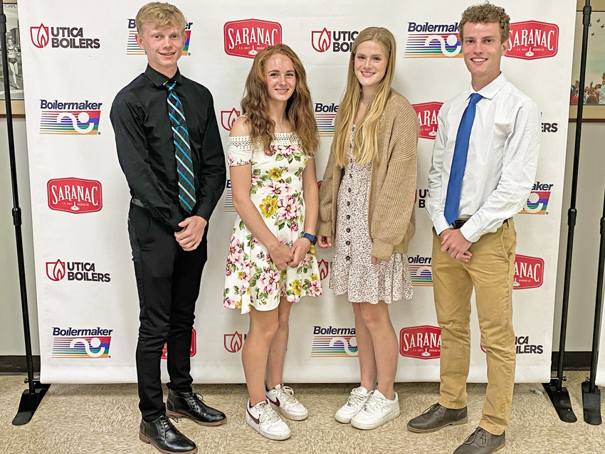 The 2022 Boilermaker Road Race Ted Petrillo Scholarship recipients, pictured left to right: Richard Zielenski, Elizabeth Lucason, Lexi Bernard and Colton Kempney.