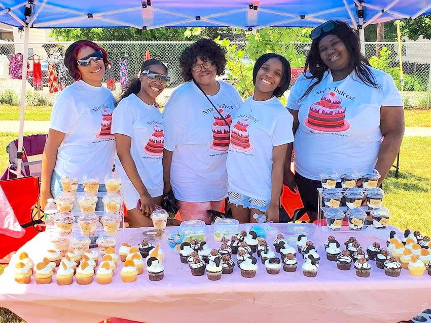 Ja&rsquo;Niya Howard, fourth from left, owner of Niya&rsquo;s Dulces, pictured at the 2021 pre-Juneteenth event. Howard, a senior at Thomas R. Proctor High School, will be back at this year&rsquo;s event with a variety of desserts on Saturday, June 11 at Kemble Park in Utica.