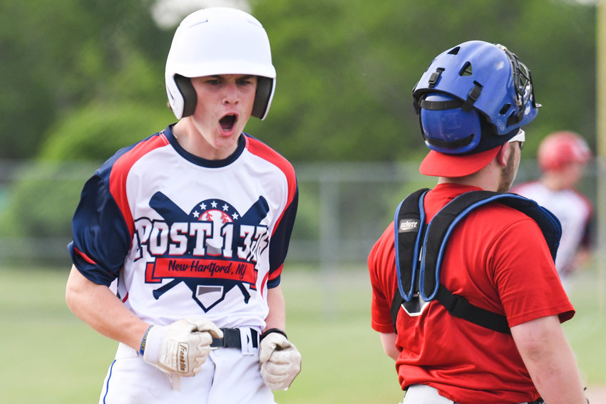 CROSSING THE PLATE &mdash; New Hartford Post player Logan Clarey reacts after scoring a run during the District V American Legion baseball game against Oriskany Post on Monday at New Hartford High School. New Hartford topped Oriskany 8-7. No details from the game were available.