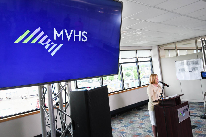 Darlene Stromstad, President and CEO of Mohawk Valley Health System, announces a new logo and brand for the healthcare company on Thursday at the Wynn Hospital Construction Offices in Utica.