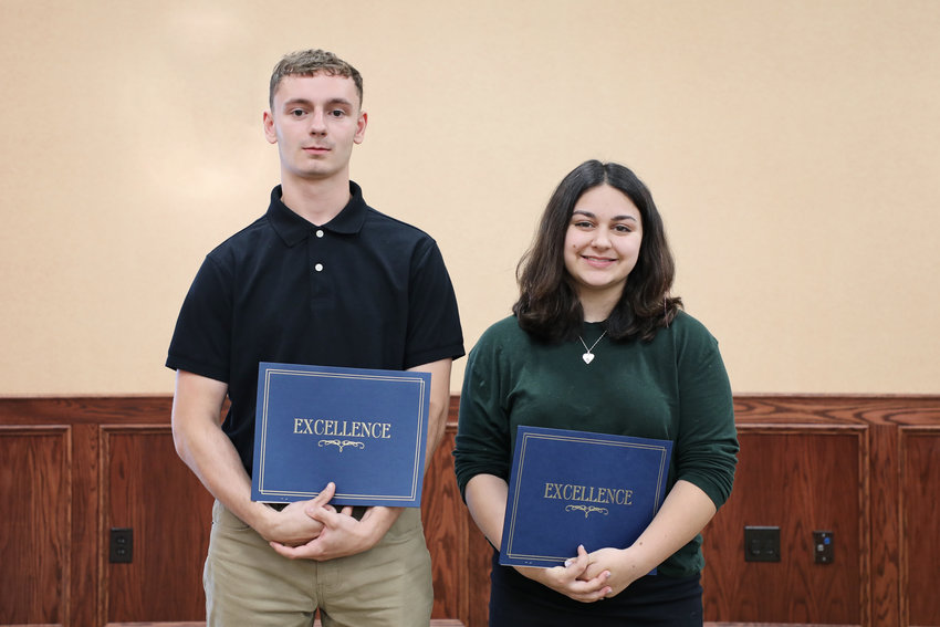 Caleb Jeff, left, from Waterville High School, and Alyssa Spina, from Whitesboro High School, pose after each was awarded a 14th annual Kathleen A. Clements Scholarship from the Oneida-Herkimer-Madison BOCES School and Business Alliance during a recent ceremony.