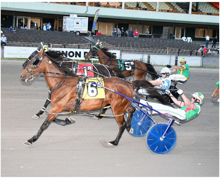 Golden Gun and driver Barton Dalious won the featured $7,700 Open Pace Saturday at Vernon Downs. The time was a season's best of 1:52.3.&nbsp;It was 12-year-old gelding's second win this season.&nbsp;He now has 45 career victories.