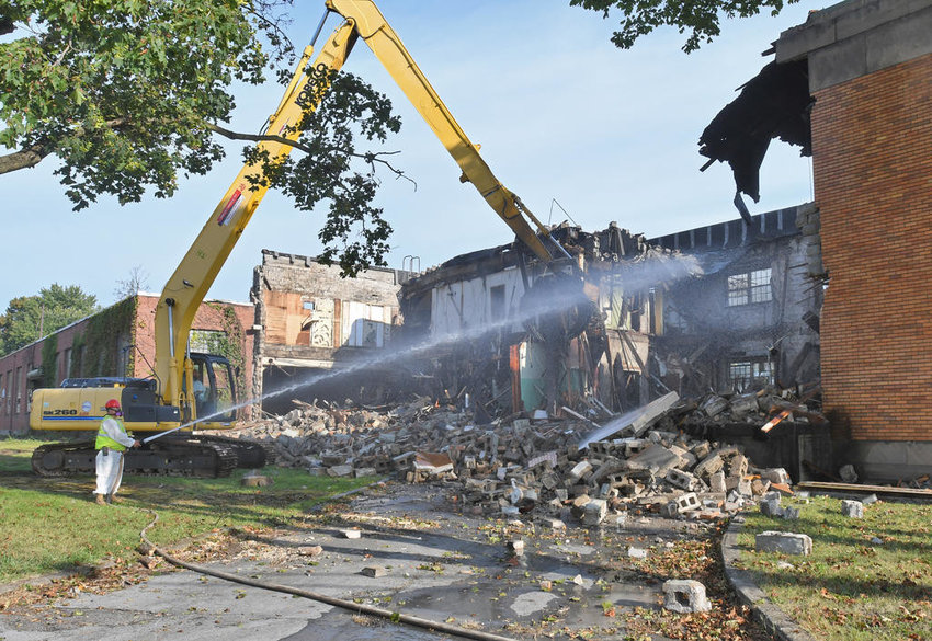 A crew from Bronze Contracting of Remsen demolishes the old Nolan Manufacturing facility at 1333 E. Dominick St. in Rome in this September 2017 file photo. The city&rsquo;s Common Council approved funding to remediate the brownfield site.