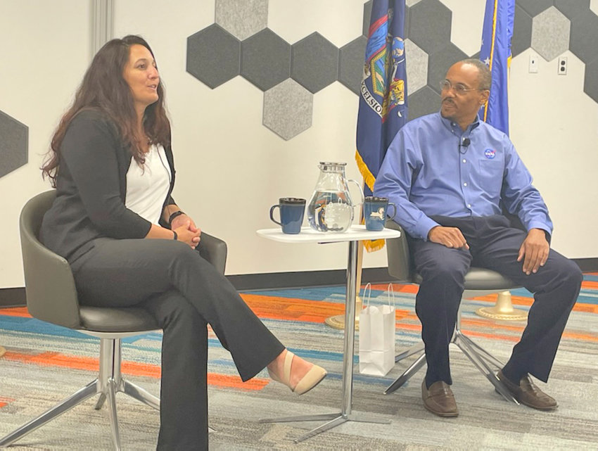 Innovare Community Manager-Griffiss Institute Melissa Tallman introduces U.S. Air Force Col. (Ret.) and Astronaut Benjamin Alvin Drew Jr. during Wednesday&rsquo;s Down to Earth talk at Innovare Advancement Center on Hangar Road in Rome.(Photo by Nicole A. Hawley)