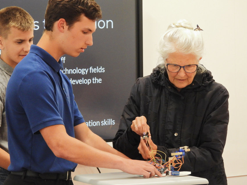 Eighth graders Andrew Kaido and Joseph Stehlik spoke before the VVS Board of Education at their regular meeting on Tuesday, looking to get the Board&rsquo;s approval for a Python and Robotics elective course for high schoolers. Board Member Ann Pangburn takes a robotic arm for a spin