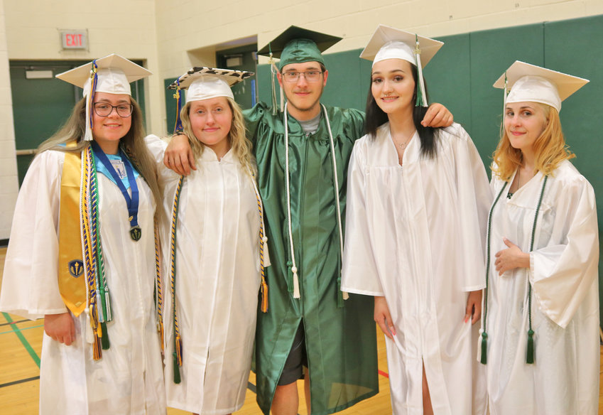 SENIOR MOMENT &mdash; A group of Adirondack students pause from getting ready to take their places for the processional to snap a quick photo, are, from left: Morgan Wilcox, Taylor Hosmer, Nicolas Southwick, Briana Stanford, and Alexia Wilson. All of the members of the senior class will be listed in a special section to be published Thursday.