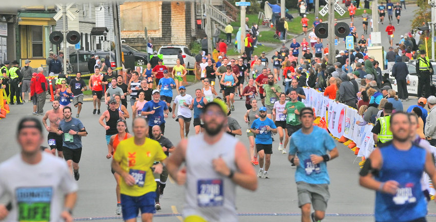 Participants make their way last year toward the Boilermaker Road Race finish line in Utica. More than 10,000 people have registered across the 15K, 5K and wheelchair races for Sunday&rsquo;s race, which is the 45th edition of Utica&rsquo;s summer event.