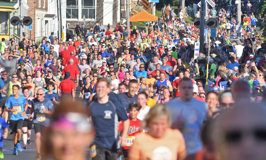 Boilermaker Road Race participants make their way toward the finish line on Court Street in 2018.