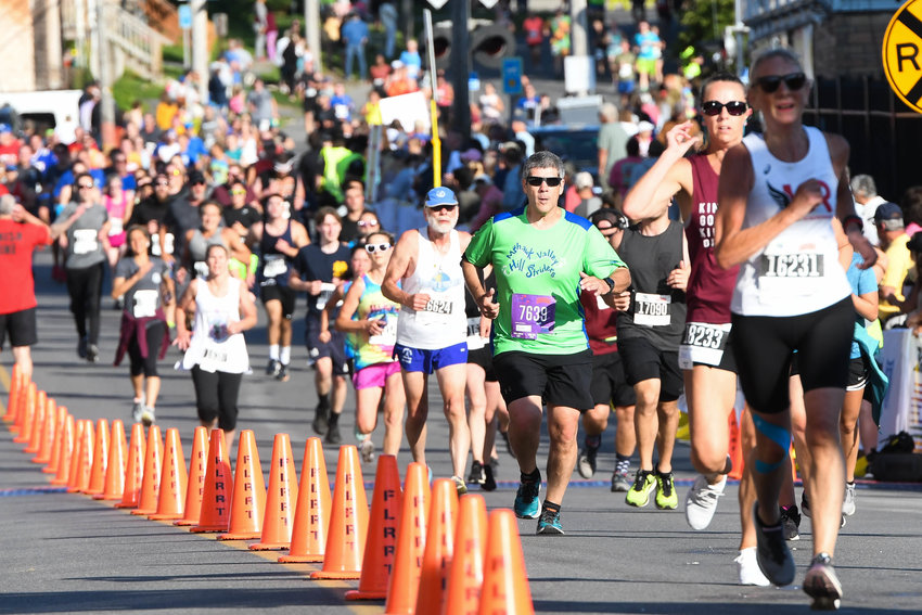 5K runners make their way to the finish line during the 45th Boilermaker Road Race on Sunday.