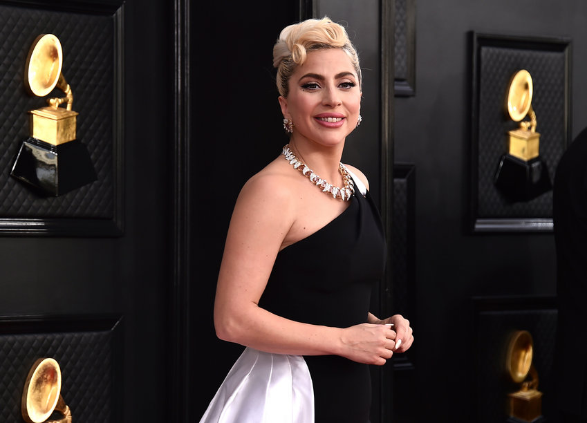 Lady Gaga arrives at the 64th annual Grammy Awards on April 3. Federal authorities are offering a $5,000 reward for information about the man who allegedly shot Lady Gaga&rsquo;s dog walker last year in Hollywood and stole two of the pop star&rsquo;s French bulldogs.
