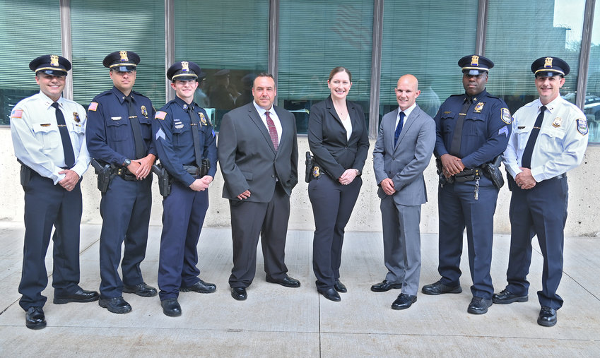 Eight Rome Police officers were promoted on Thursday during a ceremony at City Hall. From left, Captain Bryan M. Zoeckler, Lieutenant Jason W. Fairbrother, Sergeant Eric A. Stevens, Detective Shane A. Riolo, Detective Hollie B. Silverman, Detective Brian A. Stevens, Sergeant James L. Richardson Jr., and Captain Kevin M. James. Absent is Sergeant James A. Pruckno.