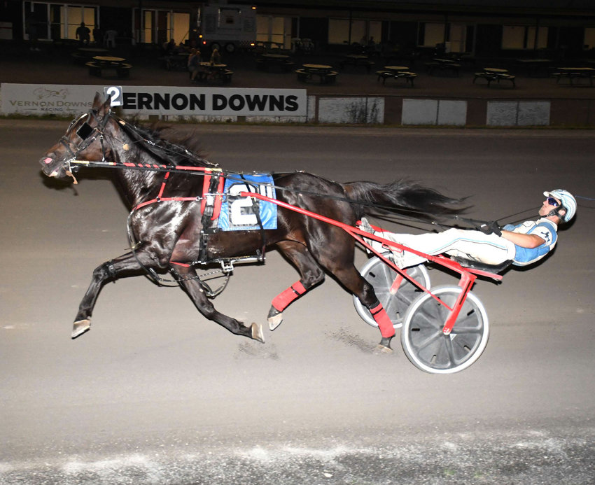 Jenny Lake with Justin Huckabone driving captures the featured $7,500 Open 2 Trot at Vernon Downs on Saturday night.