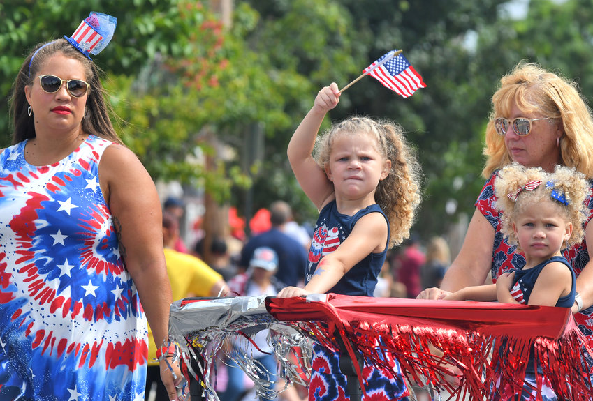 Members of the Lee Legion Post sport patriotic colors as they make their way down the parade route Saturday. Idyllic weather and enthusiastic crowds helped make for a festive Honor America Days parade in Rome on Saturday, July 30,  according to organizers.