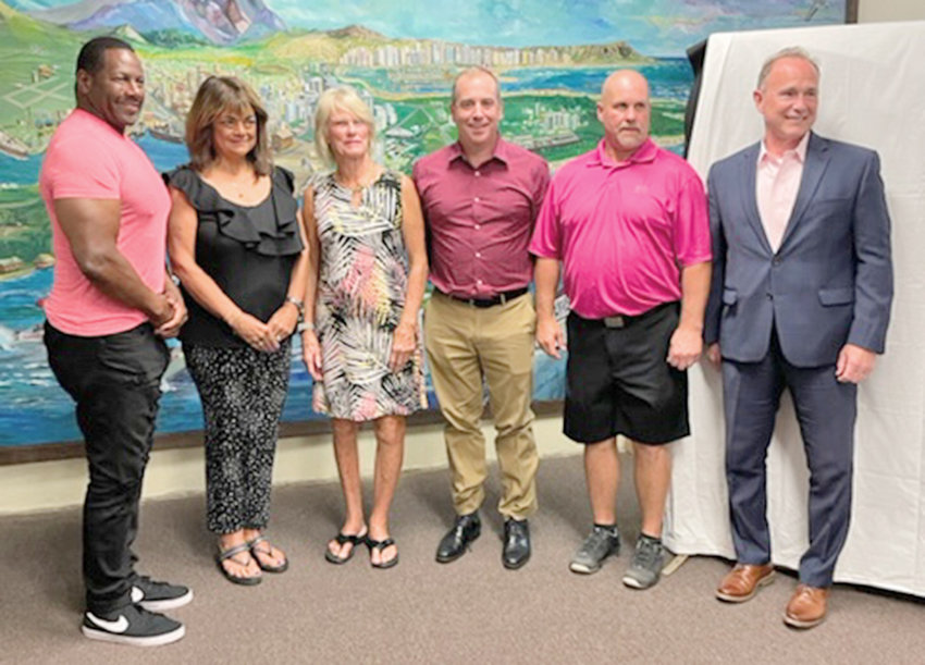 CLASS OF 2020 &mdash;&nbsp;Rome Sports Hall of Fame Class of 2020 inductees and the family members who represented them pose for a photo at the induction ceremony on Sunday. From left: Calvin Griggs; Mary Orbinati Murphy, daughter of Michael J. Orbinati; Phyllis Niemi; Brendan Ryan, son of Joseph A. Ryan Jr.; JR Purrington and Randy J. Williams.