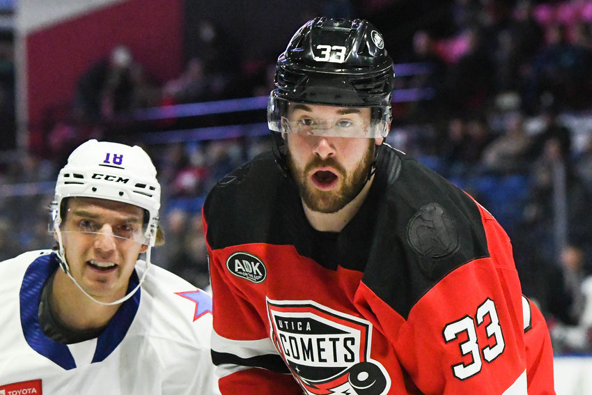 Frederik Gauthier, right, had career-bests in goals (eight), assists (24) and points (32) in his season with the Utica Comets. Gauthier has signed to play in Switzerland for next season.