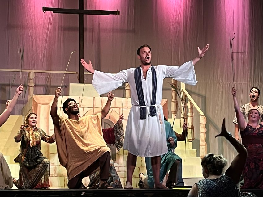 Christopher Spilka, center, sings with an ensemble, during the Capitol Theatre&rsquo;s Summerstage production of &ldquo;Jesus Christ Superstar.&rdquo; Performances continue tonight and Saturday.