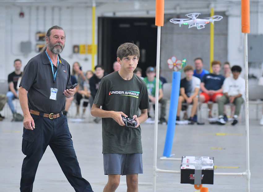 STEELY CONCENTRATION &mdash; Oriskany High School student Jack Tagliaferri navigates his drone toward one of the obstacles during the Directorate STEM Outreach Program&rsquo;s Drone Camp in the hangar at Innovare Advancement Center. Campers competed against each other on the final morning of the camp to see who could navigate the course the quickest and most accurately.
