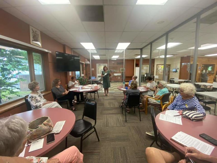 Assemblywoman Marianne Buttenschon, D-119, Marcy, discusses recently passed legislation to aid senior citizens during a meeting on Thursday, Aug. 4, at Copper City Community Connection, 305 E. Locust St.
