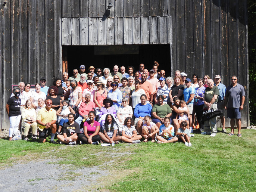 People gather for the annual Peterboro Emancipation Day photo, marking another celebration with a group photo of all in attendance at the Gerrit Smith Estate on Saturday, Aug. 6.