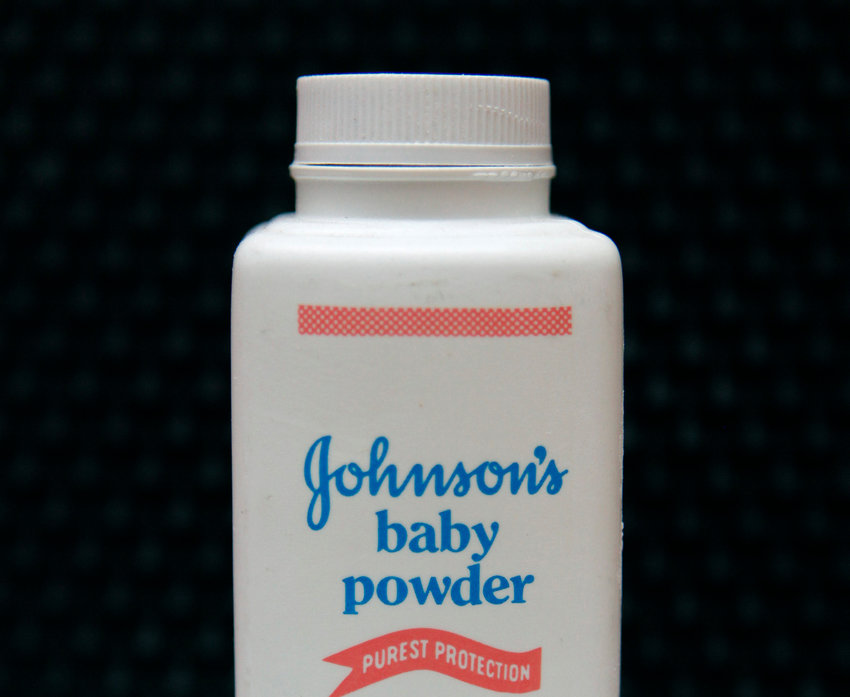 FILE - In this April 15, 2011 file photo, a bottle of Johnson's baby powder is displayed in San Francisco. Johnson &amp;amp; Johnson is pulling its iconic, talc-based Johnson&sbquo;&Auml;&ocirc;s Baby Powder from shelves worldwide next year in favor of a product based on cornstarch. The health care giant&sbquo;&Auml;&ocirc;s announcement Friday, Aug. 12, 2022, comes two years after it ended talc-based powder sales in the U.S. and Canada, where demand has dwindled amid thousands of lawsuits claiming it had caused cancer (AP Photo/Jeff Chiu, File)