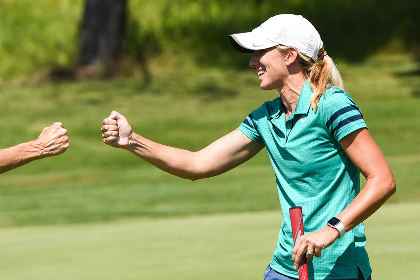 Lauren Cupp celebrates after completing the Rome City Women&rsquo;s Amateur Golf Championship on Monday at Rome Country Club. Cupp shot a 69, a women&rsquo;s course record, to lead the field of 16 golfers. It was her ninth title.