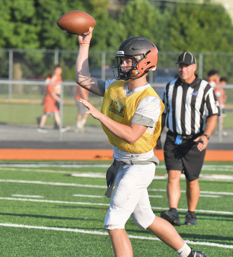 Rome Free Academy junior quarterback Evan Carlson-Stephenson makes a pass during a seven-on-seven scrimmage with Camden at RFA Stadium in the preseason. The returning quarterback and the rest of the Black Knights will host New Hartford tonight at 6:30 at the stadium to start both teams&rsquo; seasons.