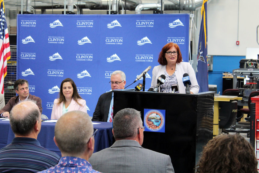 North Country Workforce Partnership Executive Director Sylvie Nelson speaks at an event unveiling the Advanced Manufacturing Scholarship Program at Clinton Community College&rsquo;s Institute for Advanced Manufacturing.