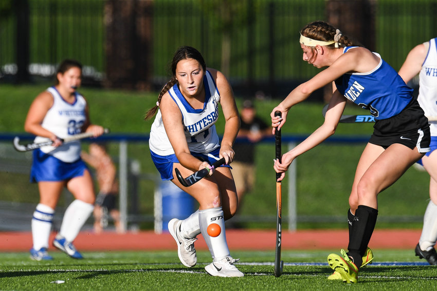 Whitesboro&rsquo;s Talia Nash, center, controls the ball against Camden&rsquo;s Gabby Croniser, right, during the field hockey game on Wednesday. Croniser scored both goals for the Blue Devils in the team&rsquo;s 2-1 win.