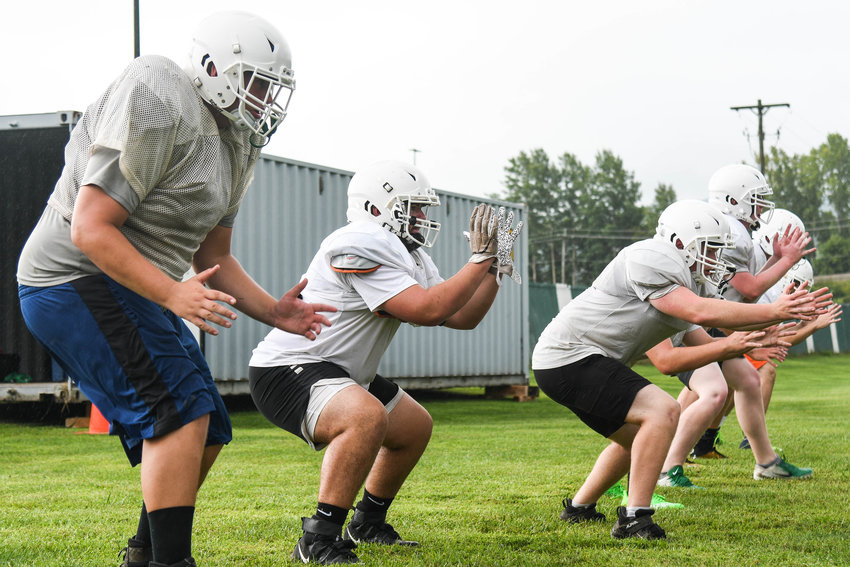 Herkimer linemen work on drills early during practice. Herkimer&rsquo;s coach Mike Jory said the linemen are &ldquo;bigger, faster and stronger&rdquo; compared to last fall.