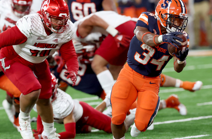 Syracuse running back Sean Tucker reaches for the goal line during a game against Louisville last Saturday in Syracuse.
