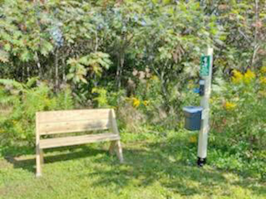 Volunteers built four wooden benches and four waste stations for the Humane Society of Rome and placed them along the organization&rsquo;s walking trail behind its shelter on Lamphear Road.