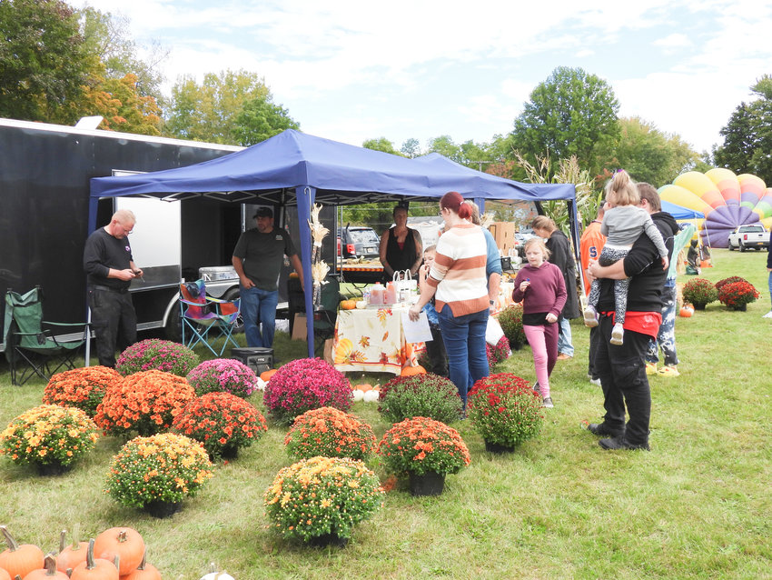 People browse all manner of goods being sold at the second annual Oneida Fall Fest on Saturday, Oct. 1.