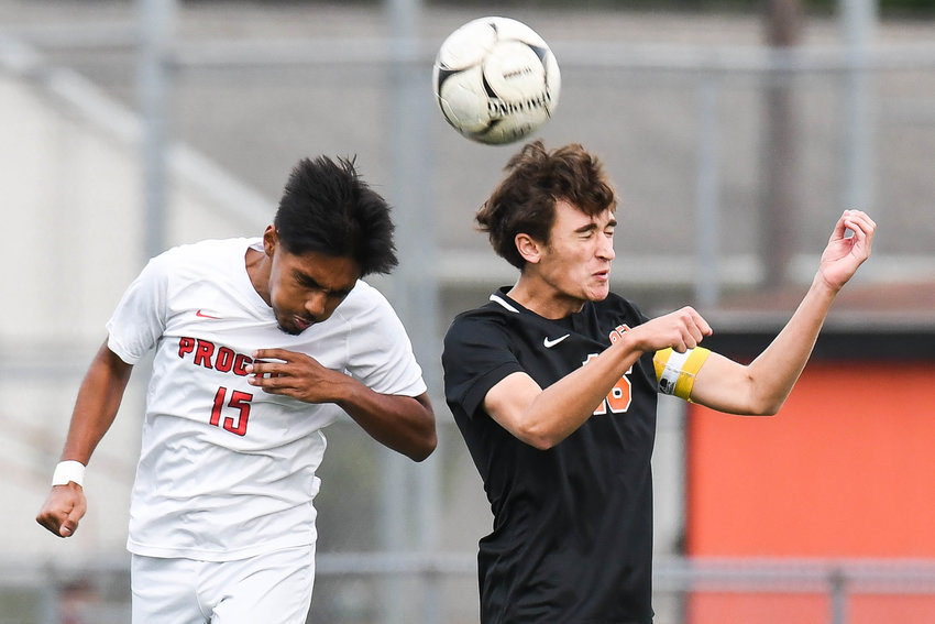 Proctor&rsquo;s Weya Myint, left, and Rome Free Academy player Lucas Yanik both go up to head the ball during a Tri-Valley League game on Tuesday at RFA Stadium. The visiting Raiders won 4-0.