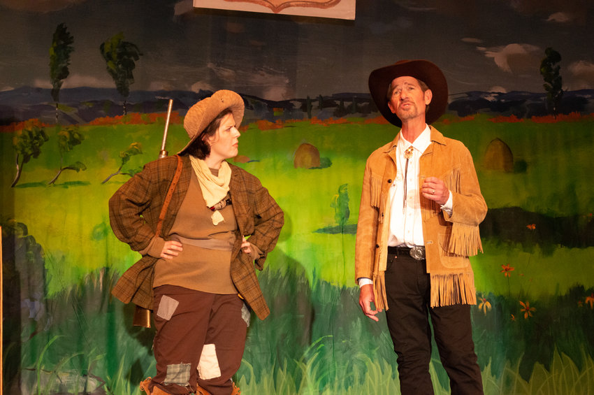 From left, Valerie Abel as Annie Oaklay and Walter Moore as Frank Butler in a scene from &ldquo;Annie Get Your Gun&rdquo; at Rome Community Theater.