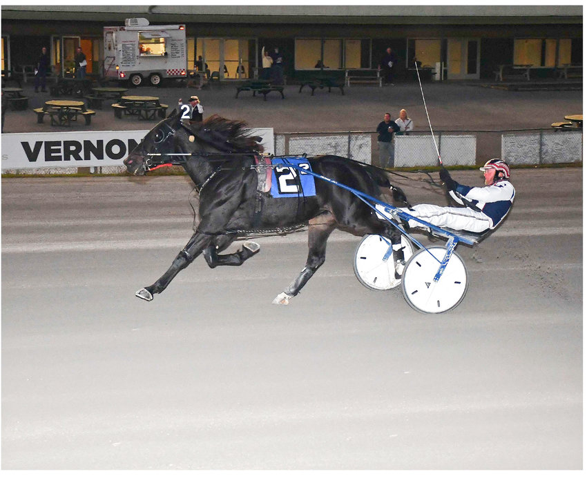 Poker Play driven by Truman Gale goes from last to first to capture the featured $7,200 trot at Vernon Downs on Saturday night.