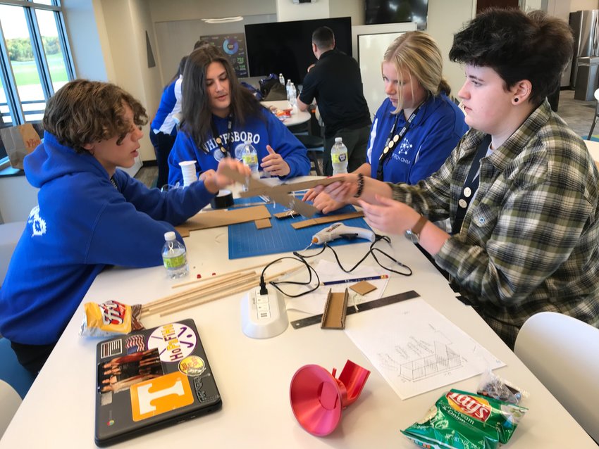 Oneida-Herkimer-Madison BOCES students, from left, Quincy Stayton, Aidan Johnson, Lily Boris and Finn Burlington compete in Engineering Wars Friday at the Innovare Advancement Center in Rome.