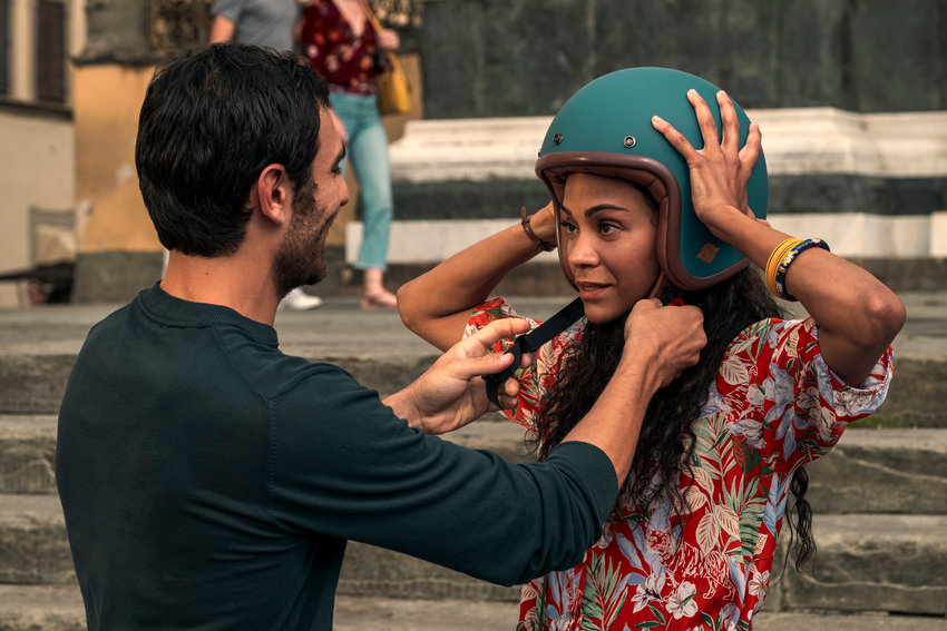 This image released by Netflix shows Eugenio Mastrandrea as Lino Ortolano, left, and Zoe Saldana as Amy Wheeler in a scene from &ldquo;From Scratch.&rdquo;