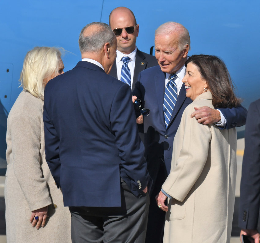 WELCOME WAGON &mdash; President Joseph Biden chats with U.S. Senators Kirsten Gillibrand and Charles E. Schumer, and Gov. Kathy Hochul at Syracuse&rsquo;s Hancock International Airport during his visit visit to Syracuse on Thursday, Oct. 27. Biden was to spend about four hours in Syracuse, speaking at Onondaga Community College about Micron Technology&rsquo;s plans to invest up to $100 billion in a computer chip fabrication complex in Clay, a Syracuse suburb.