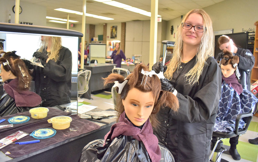 Grace Koppany, a Herkimer-Fulton-Hamilton-Otsego BOCES cosmetology student, practices her hairdressing skills.