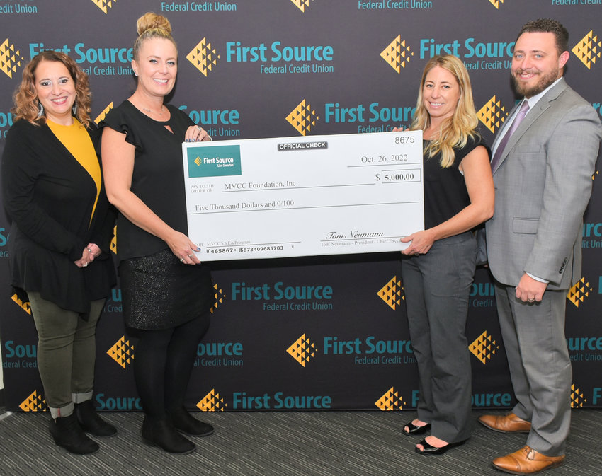 Holding a ceremonial check made out to MVCC Foundation, Inc. for $5,000 from First Source Federal Credit Union are, from left, MVCC Institutional Advancement Director of Development Courtney Taurisano-Sprague, Executive Director of Institutional Advancement and the MVCC Foundation Deanna Ferro-Aurience, First Source Community Relations Supervisor Pamela Way and First Source Director of Member Services Christopher Dovi.