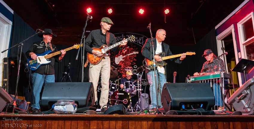 The Dust Devil Band, featuring, from left, Dane Porter, George Deveny, Darryl Mattison, Ed Rosenburgh and George Newton, is part of the all-star lineup at a benefit for Nicole Deveny Gaines-Parker at 3 p.m. Nov. 20 at Unity Hall in Barneveld.