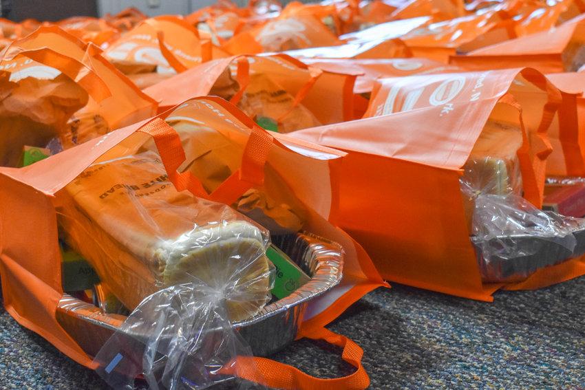 Volunteers filled over 100 bags with the ingredients for a traditional Thanksgiving meal.