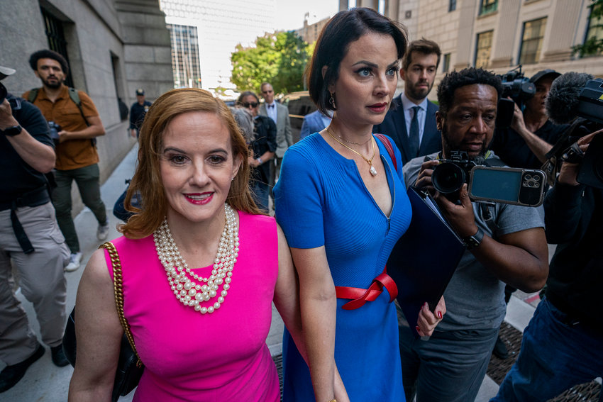 Elizabeth Stein, left, and Sarah Ransome, an alleged victim of Jeffrey Epstein and Ghislaine Maxwell, walk to federal court, Tuesday, June 28, 2022, in New York. Sexual assault victims in New York will get a one-time opportunity to sue their abusers starting Thursday under a new law expected to bring a wave of litigation against prison guards, middle managers, doctors and a few prominent figures including former President Donald Trump.