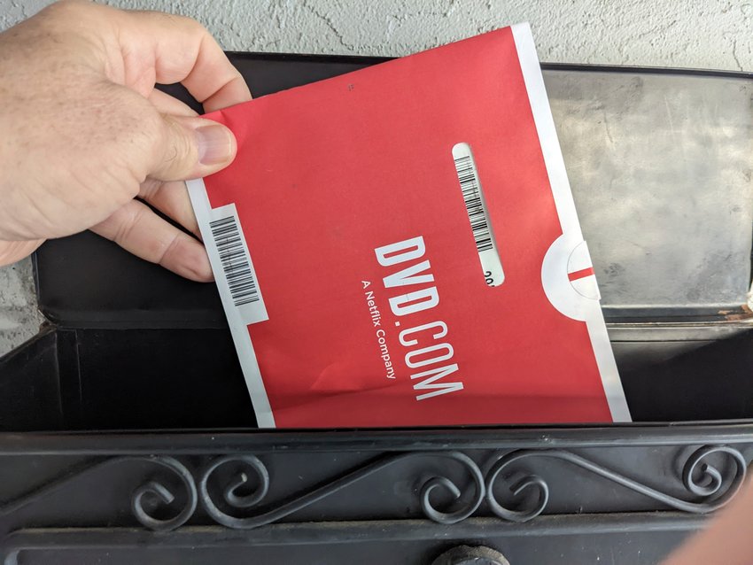 A Netflix DVD envelope is shown on Nov. 17, 2022 in San Francisco.  Subscribers to Netflix&rsquo;s DVD-by-mail service still look forward to opening up their mailbox and finding one of the discs delivered in the familiar red-and-white envelopes.
